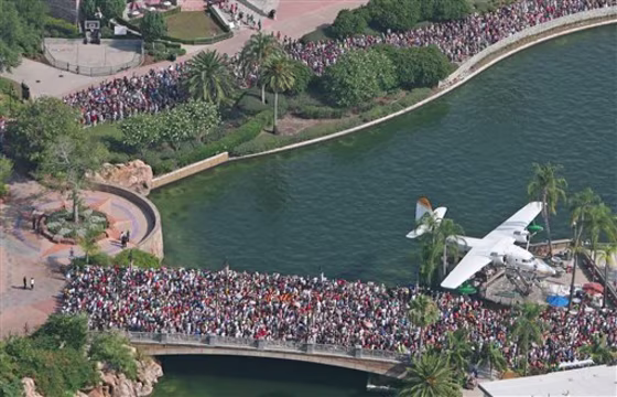 Aerial view of the thousands lined up for the grand opening of the Wizarding World of Harry Potter at Universal’s Islands of Adventure. 